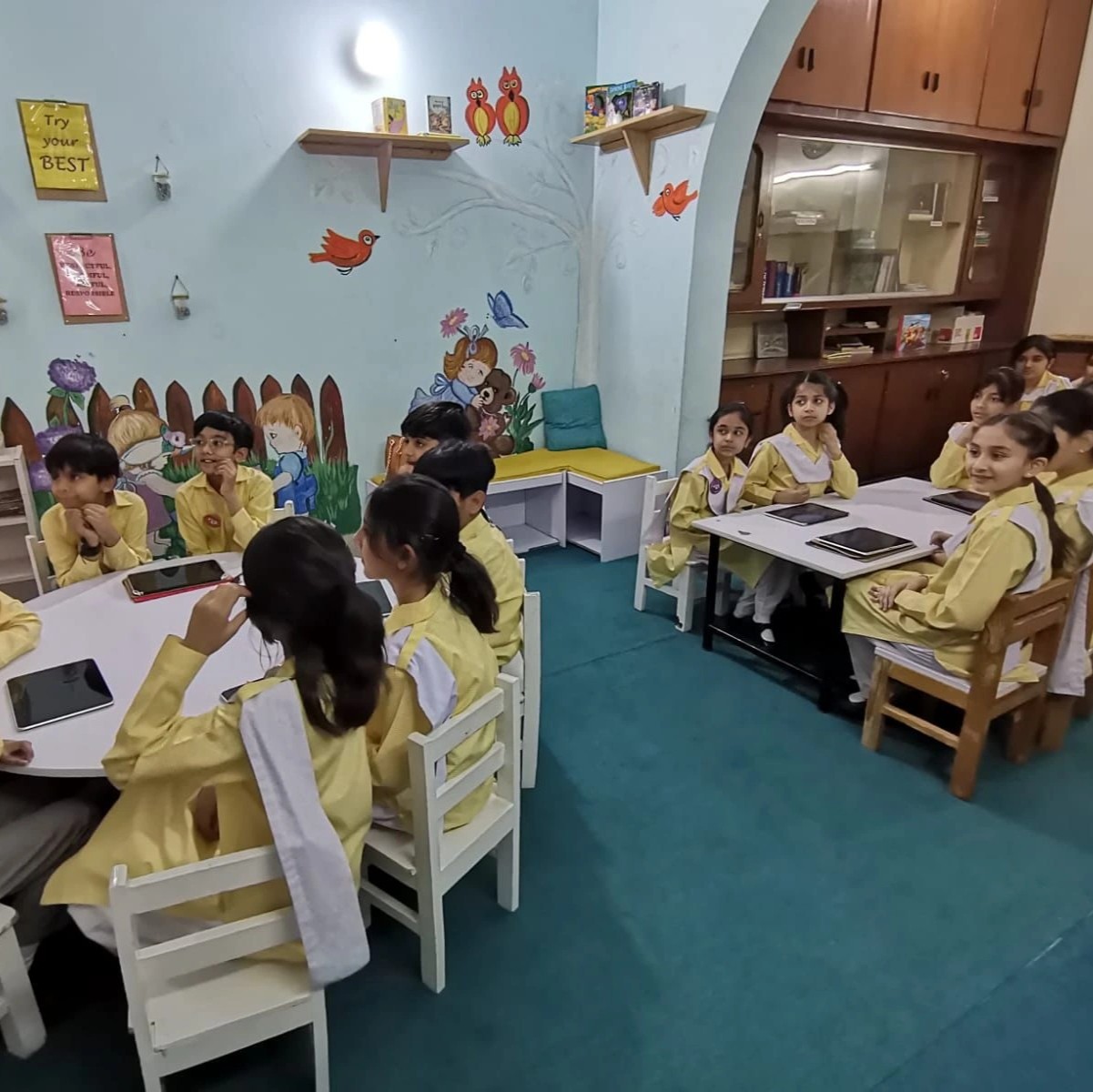 A teacher guiding a student